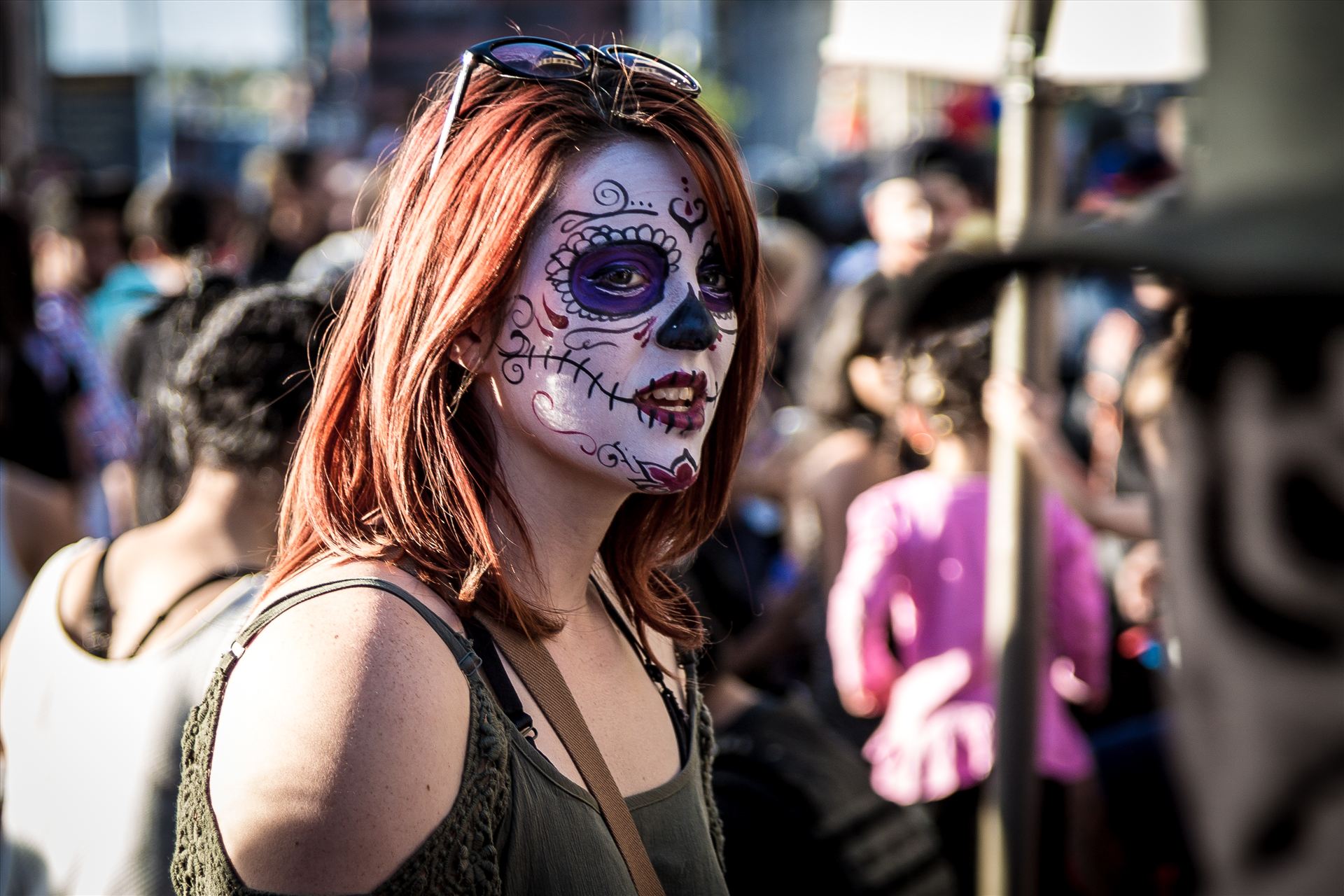 Denver Zombie Crawl 2015 21 A redhead with day of the dead makeup at the Denver Zombie Crawl 2015 by Scott Smith Photos