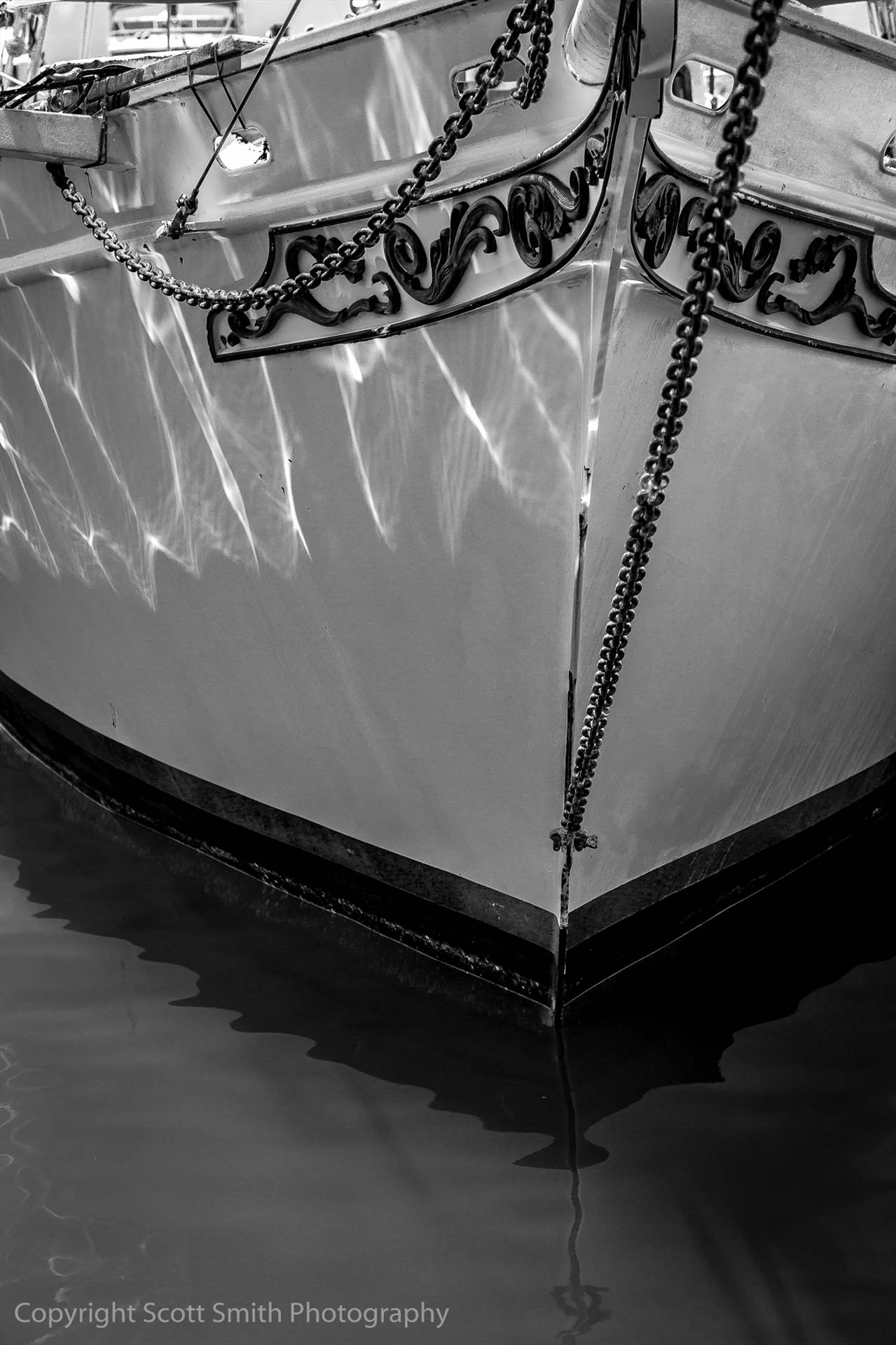 Reflections A beautiful old ship rests at dock in a Key West marina. by Scott Smith Photos