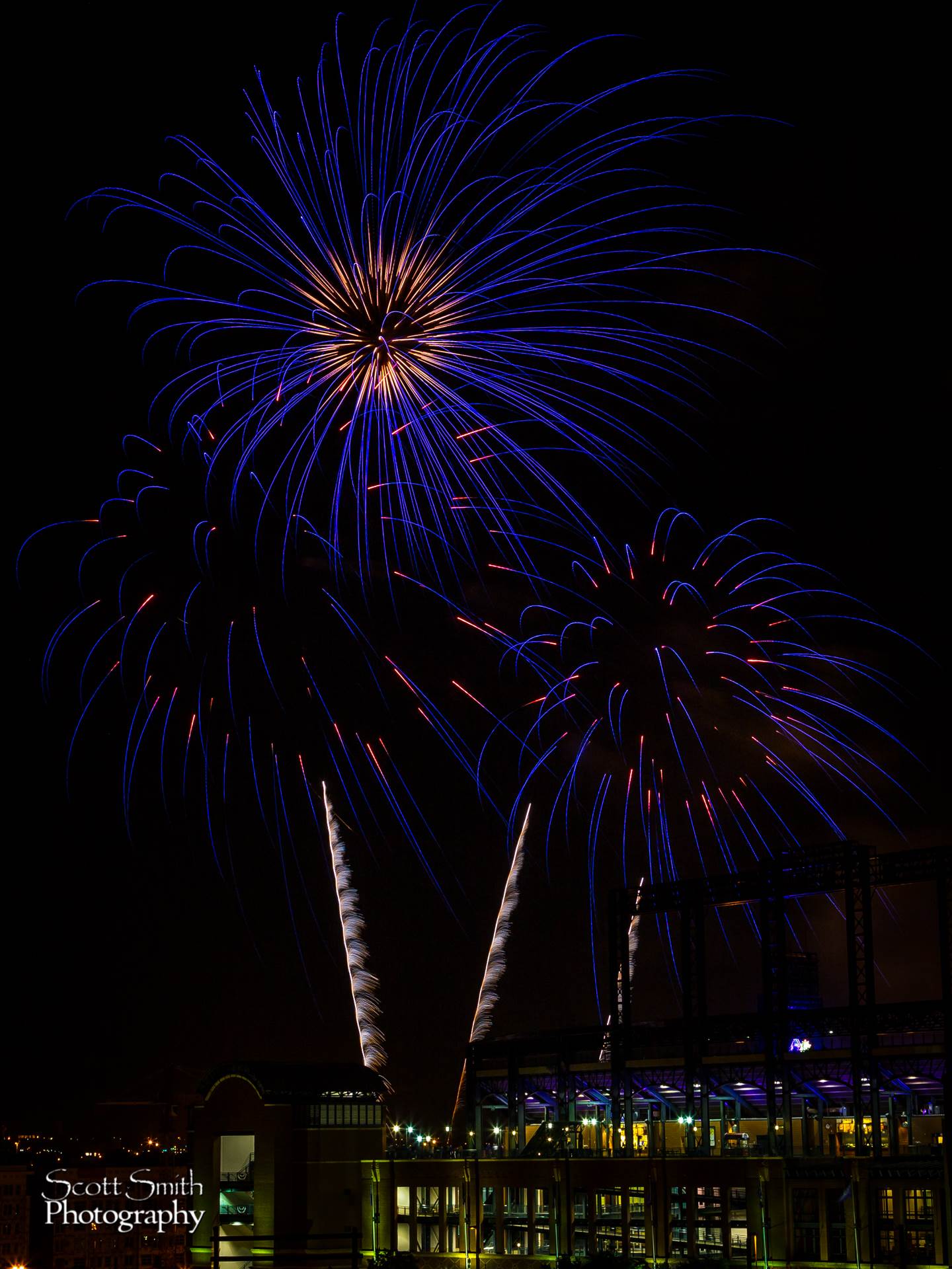 Fireworks over Coors Field 3 Fourth of July fireworks over Coors Field after a Colorado Rockies game. by Scott Smith Photos
