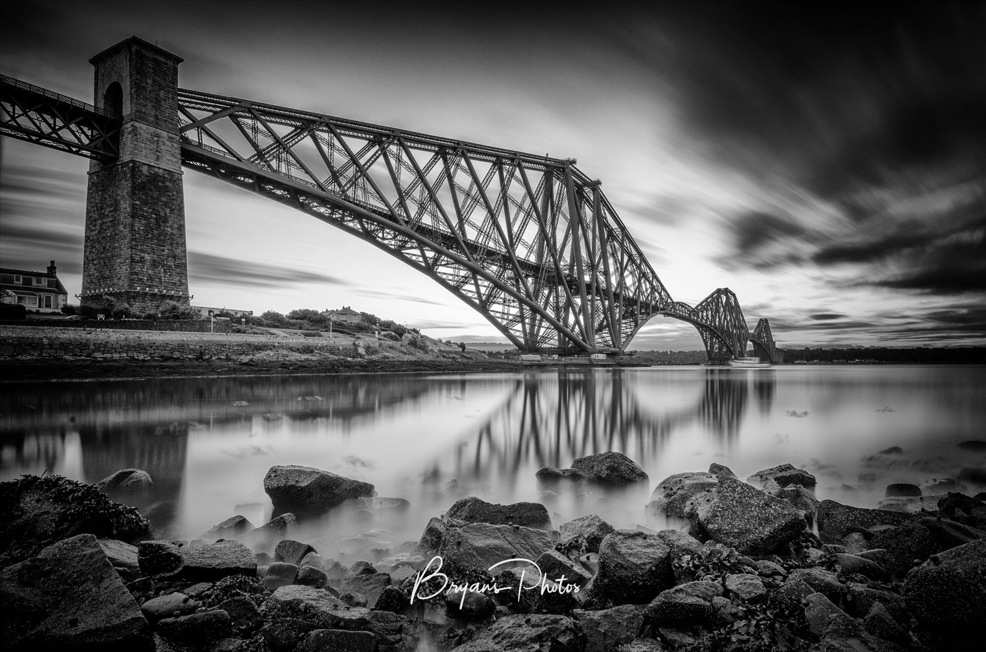 The Bridge Black and White A black and white long exposure photograph of the iconic Forth Rail Bridge taken on a summer evening from North Queensferry on the banks of the river Forth. by Bryans Photos