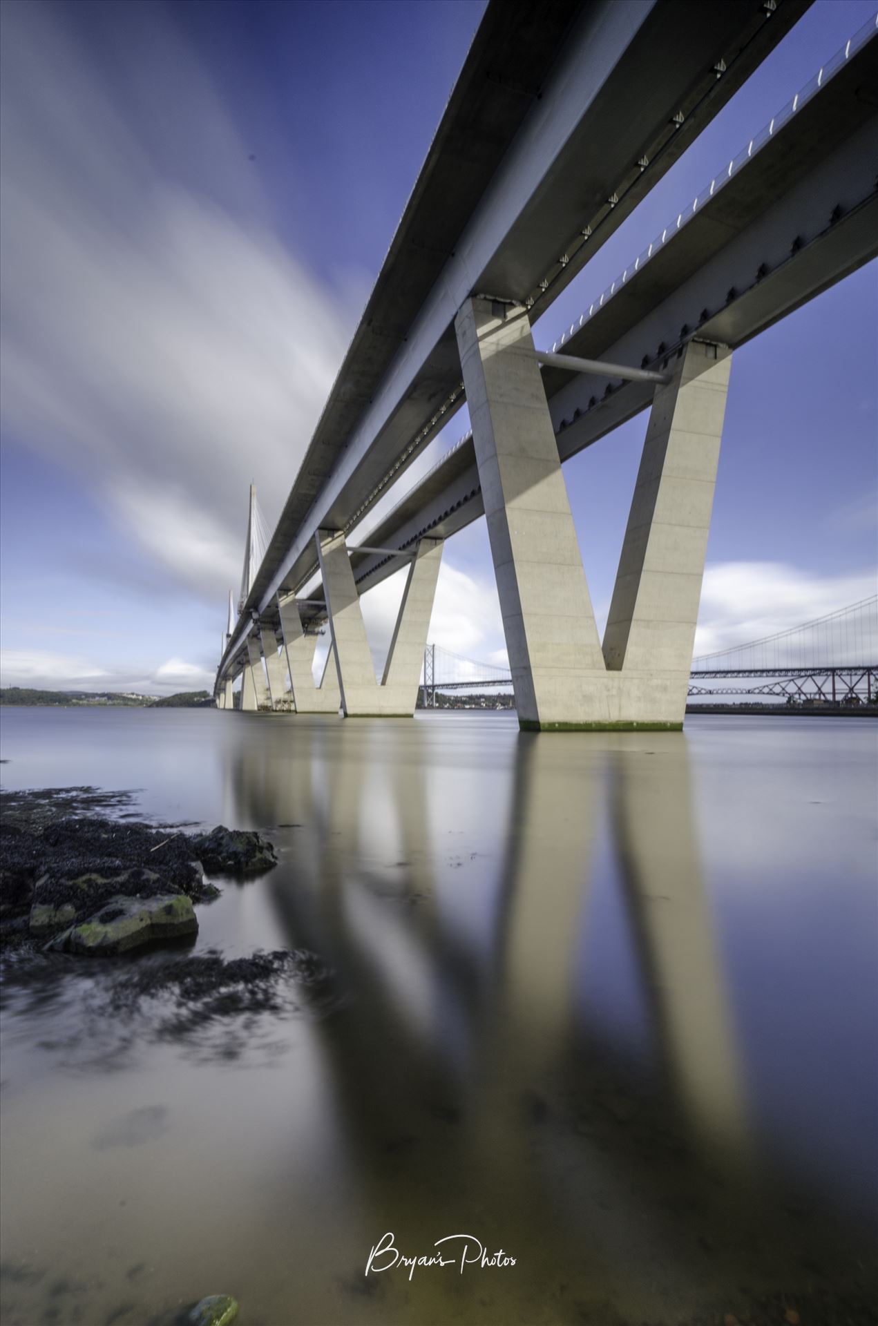 Queensferry Crossing Portrait A long exposure photograph of the Queensferry Crossing taken from the south bank of the river Forth at high tide. by Bryans Photos