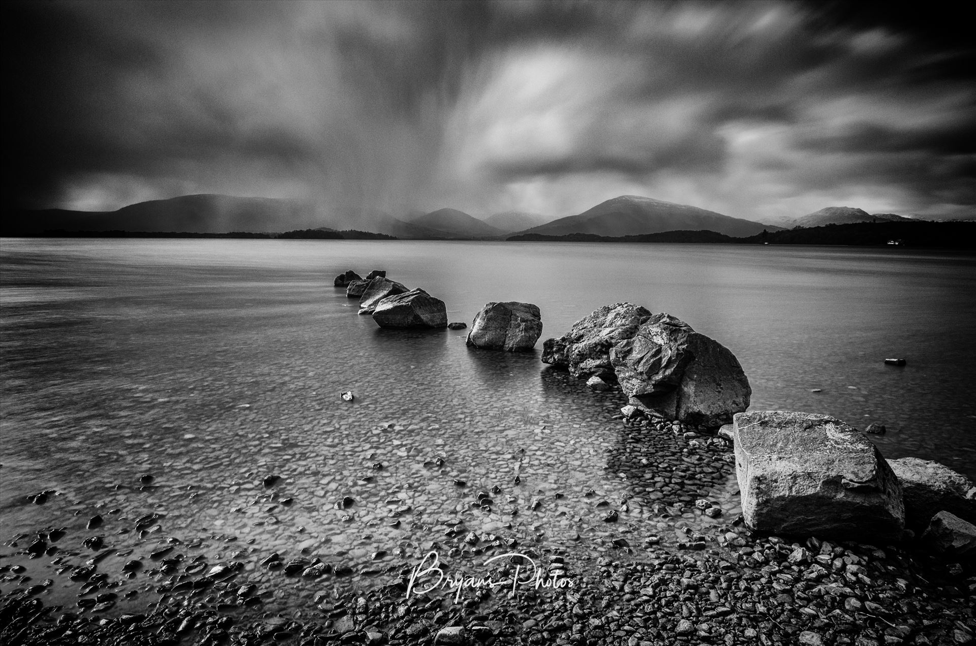 The Loch A black and white long exposure photograph of Loch Lomond taken from Milarrochy Bay. by Bryans Photos