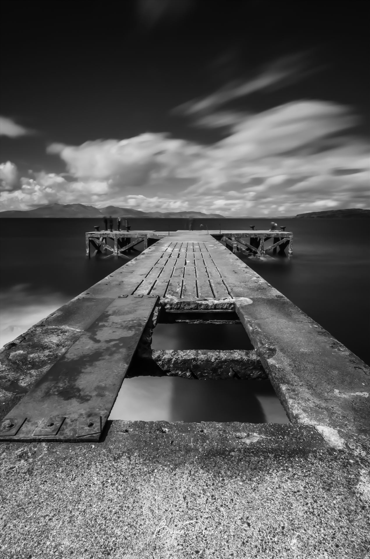 Portencross Pier A photograph of the pier at Portenross looking over towards the Isle of Arran. by Bryans Photos