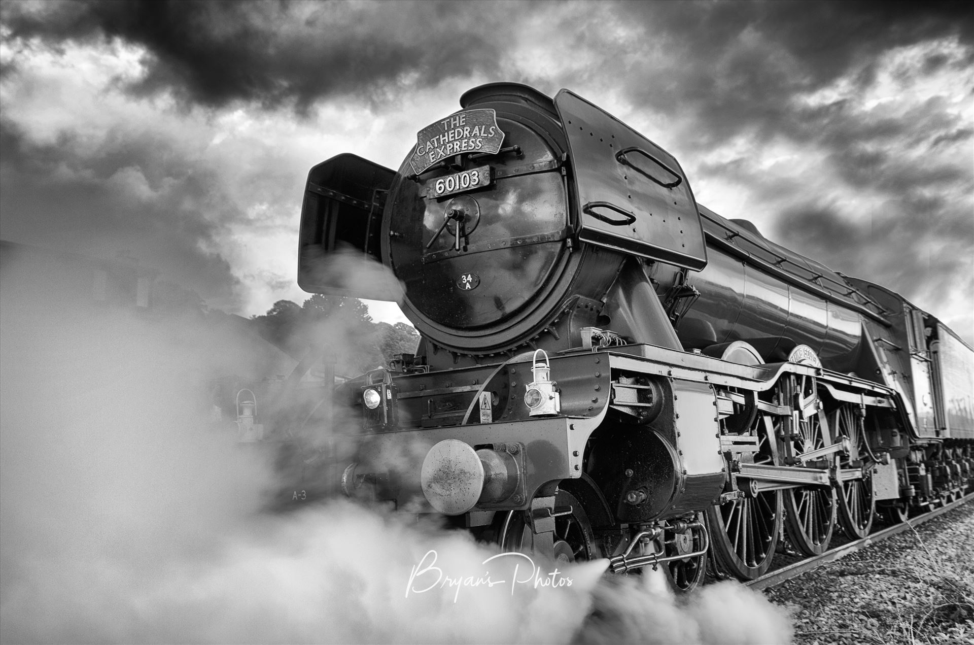 All steamed up A black and white photograph of the world famous Flying Scotsman passing through Newmills as part of it's tour around Fife and Forth Valley. Not suitable for canvas wrap. by Bryans Photos