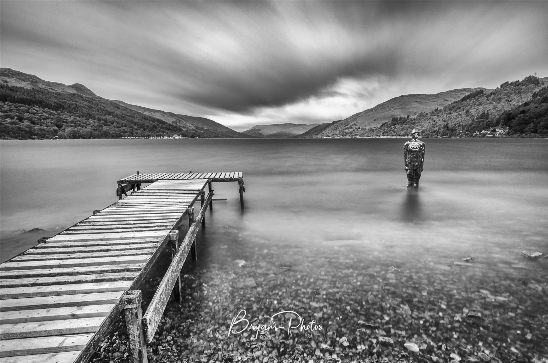 Loch Earn A black and white long exposure photograph of Loch Earn taken from St Fillans. by Bryans Photos