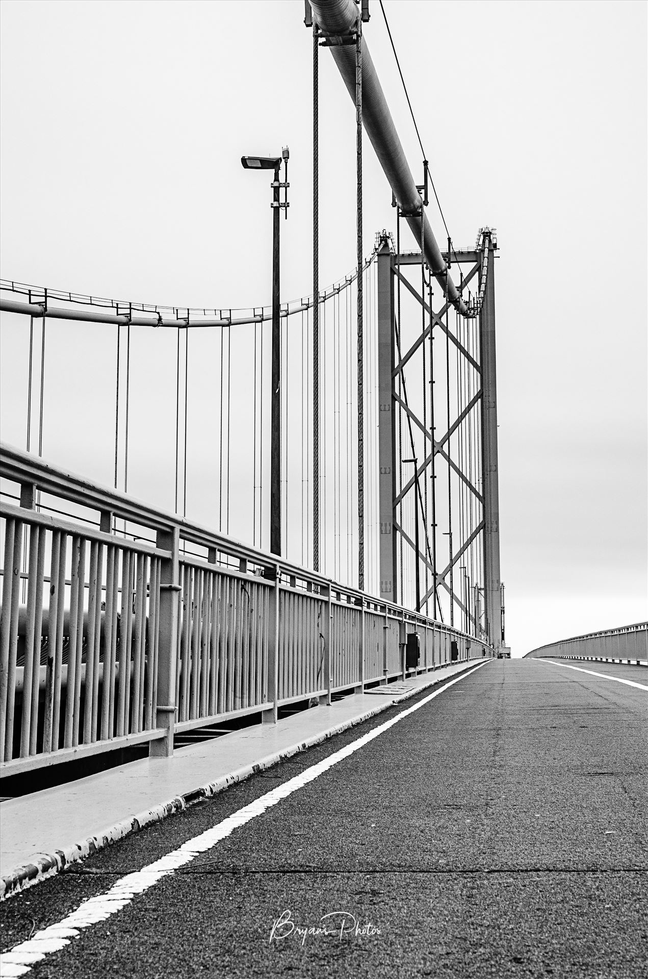 Forth Road Bridge A black and white photograph of the Forth Road Bridge taken from the walkway. by Bryans Photos