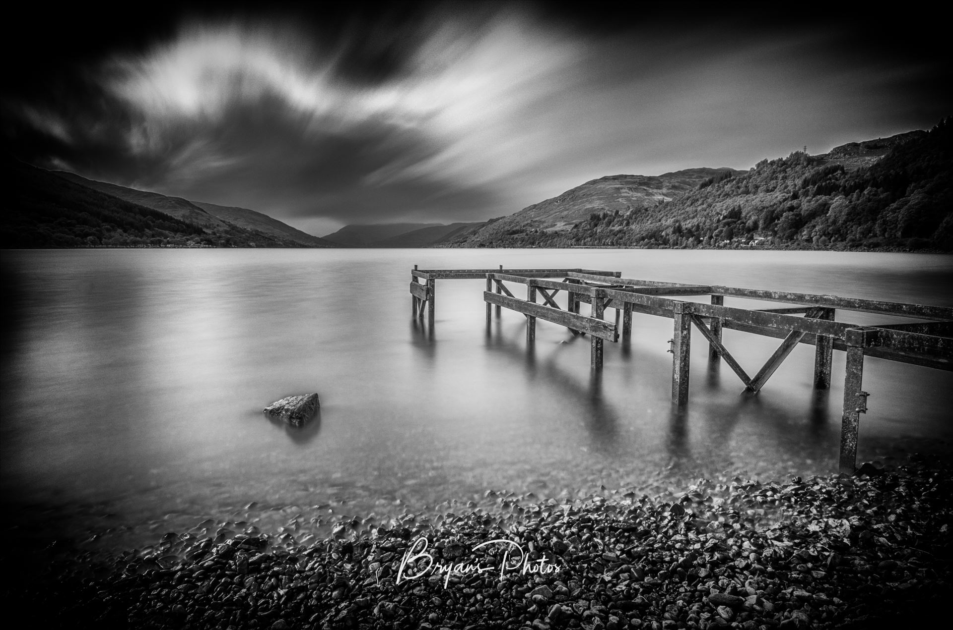 Loch Earn at St Fillans A black and white long exposure photograph of Loch Earn taken from St Fillans. by Bryans Photos