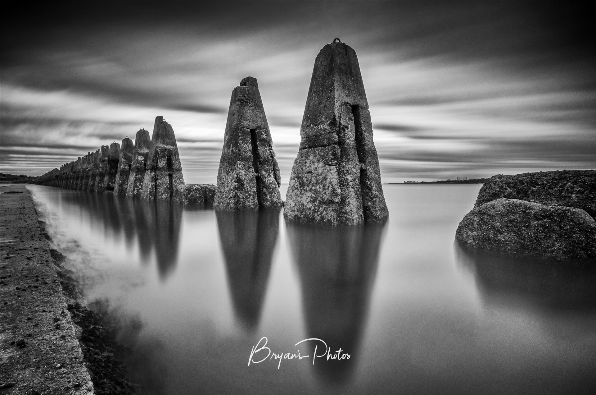 The Causeway A black & white daytime long exposure photograph of the causeway to Cramond Island in the Firth of Forth. by Bryans Photos