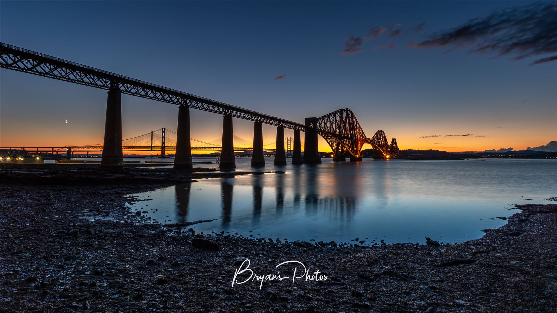 The Bridge After Sunset A panoramic photograph of the Forth Rail Bridge taken after sunset from South Queensferry. by Bryans Photos