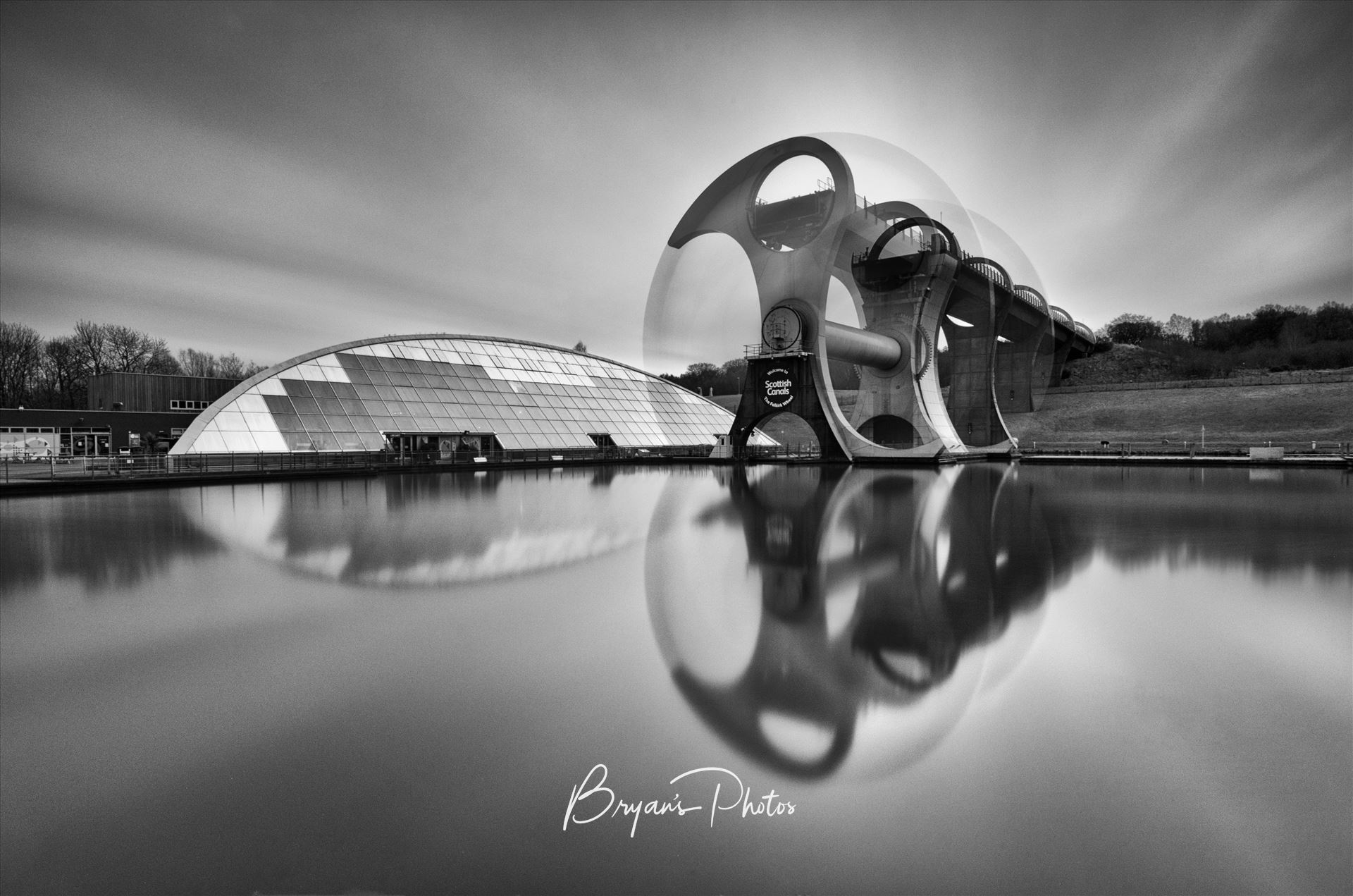 The Wheel A black and white long exposure photograph of the famous Falkirk wheel in motion. by Bryans Photos