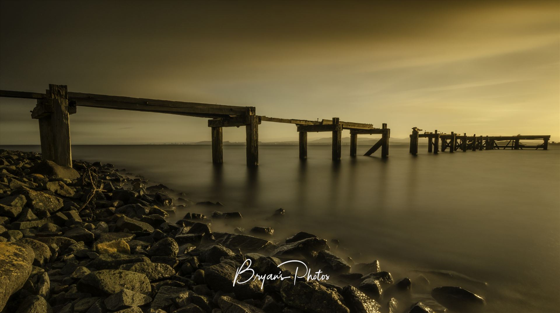 Aberdour Sunset A long exposure photograph of the abandoned pier at Aberdour taken at sunset. by Bryans Photos