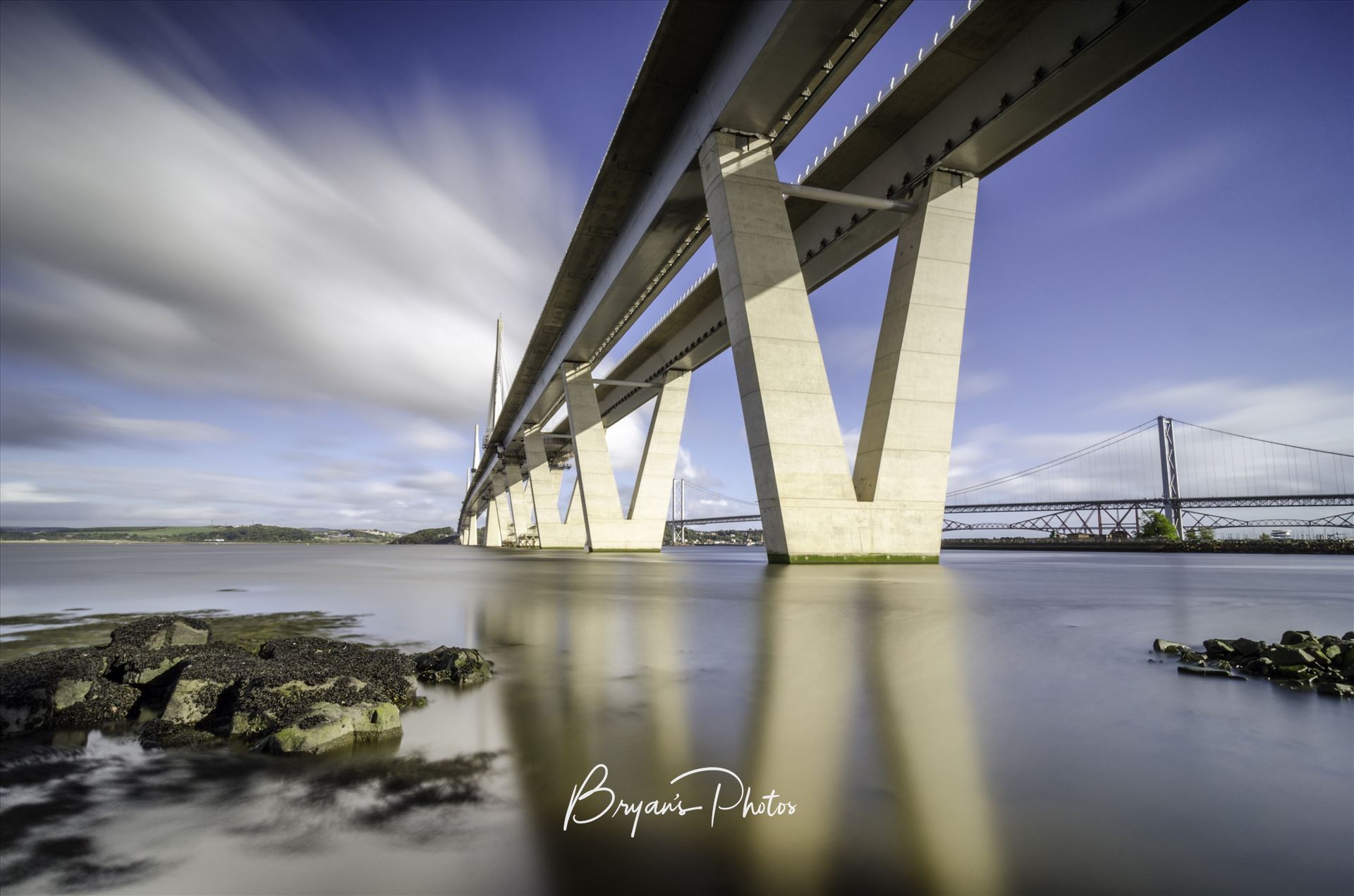 The Crossing Landscape A long exposure photograph of the Queensferry Crossing taken from the south bank of the river Forth at high tide. by Bryans Photos