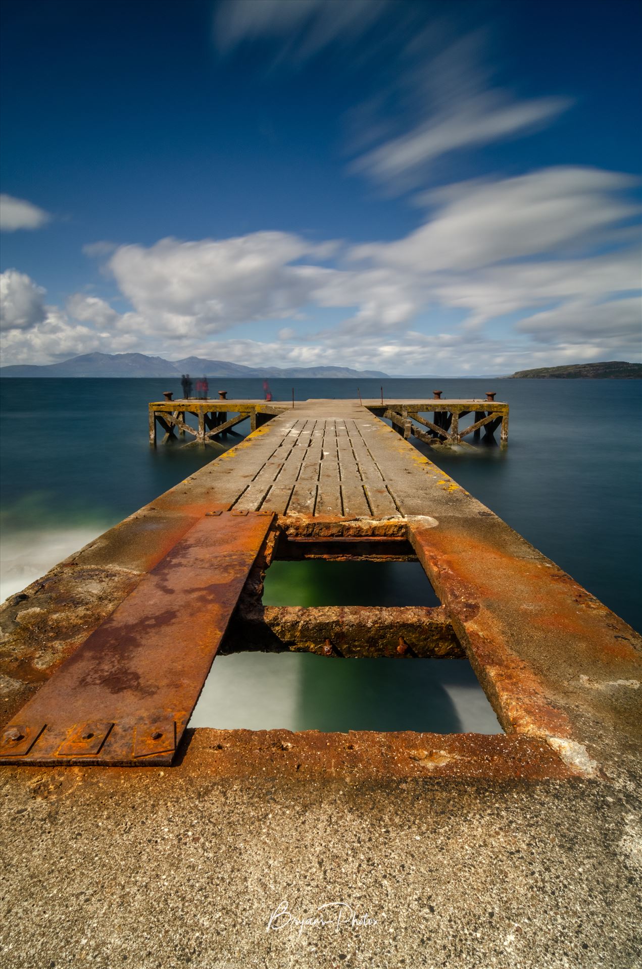 Pier at Portencross A photograph of the pier at Portenross looking over towards the Isle of Arran. by Bryans Photos