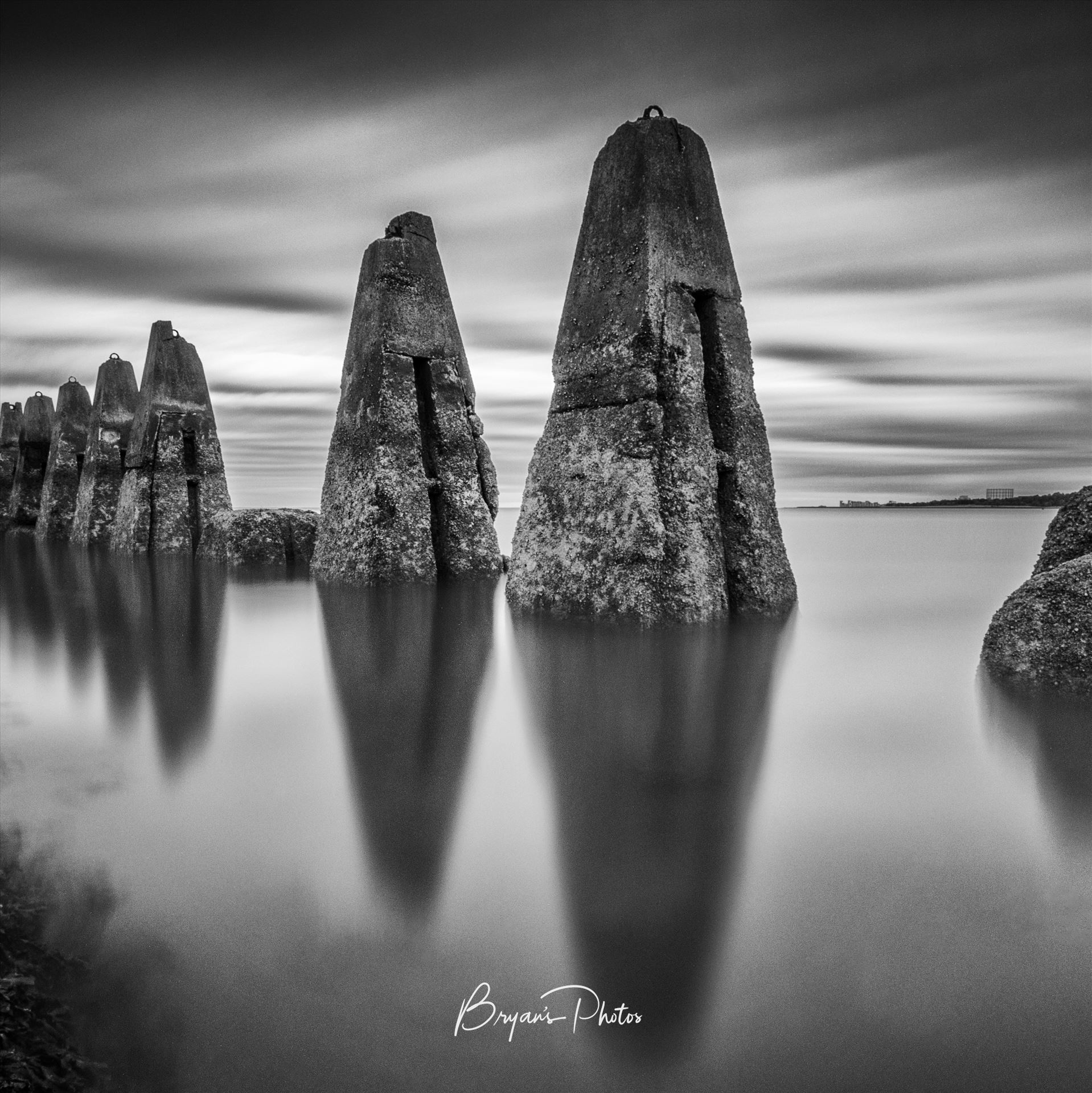 Causeway At Cramond A black & white daytime long exposure photograph of the causeway to Cramond Island in the Firth of Forth. by Bryans Photos