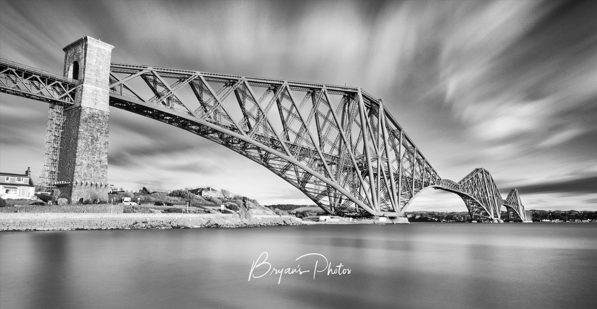 The Bridge Panorama A black and white panoramic long exposure photograph of the iconic Forth Rail Bridge taken from North Queensferry. by Bryans Photos