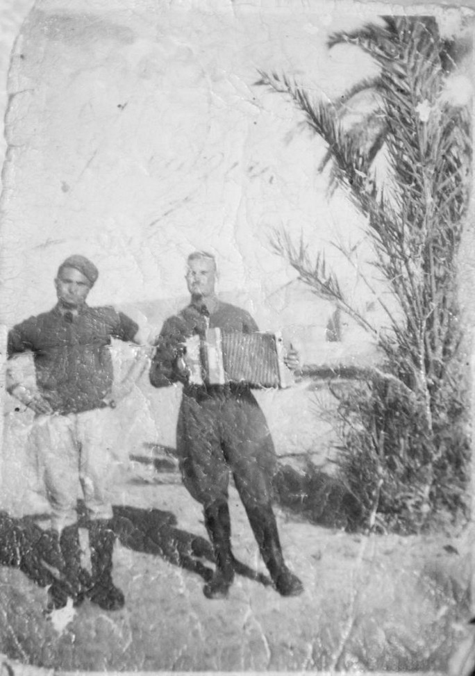 Giuseppe Torcasio: playing a diatonic button accordion italian soldiers ww2 Giuseppe Torcasio playing a diatonic button accordion which he used to entertain the soldiers. WWII North Africa. by johntorcasio