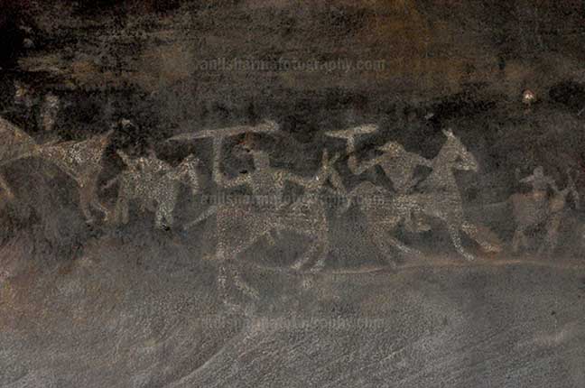 Archaeology- Bhimbetka Rock Shelters Prehistoric Rock Painting of Worriars on horses in the battle field at Bhimbetka archaeological site by Anil Sharma Photography