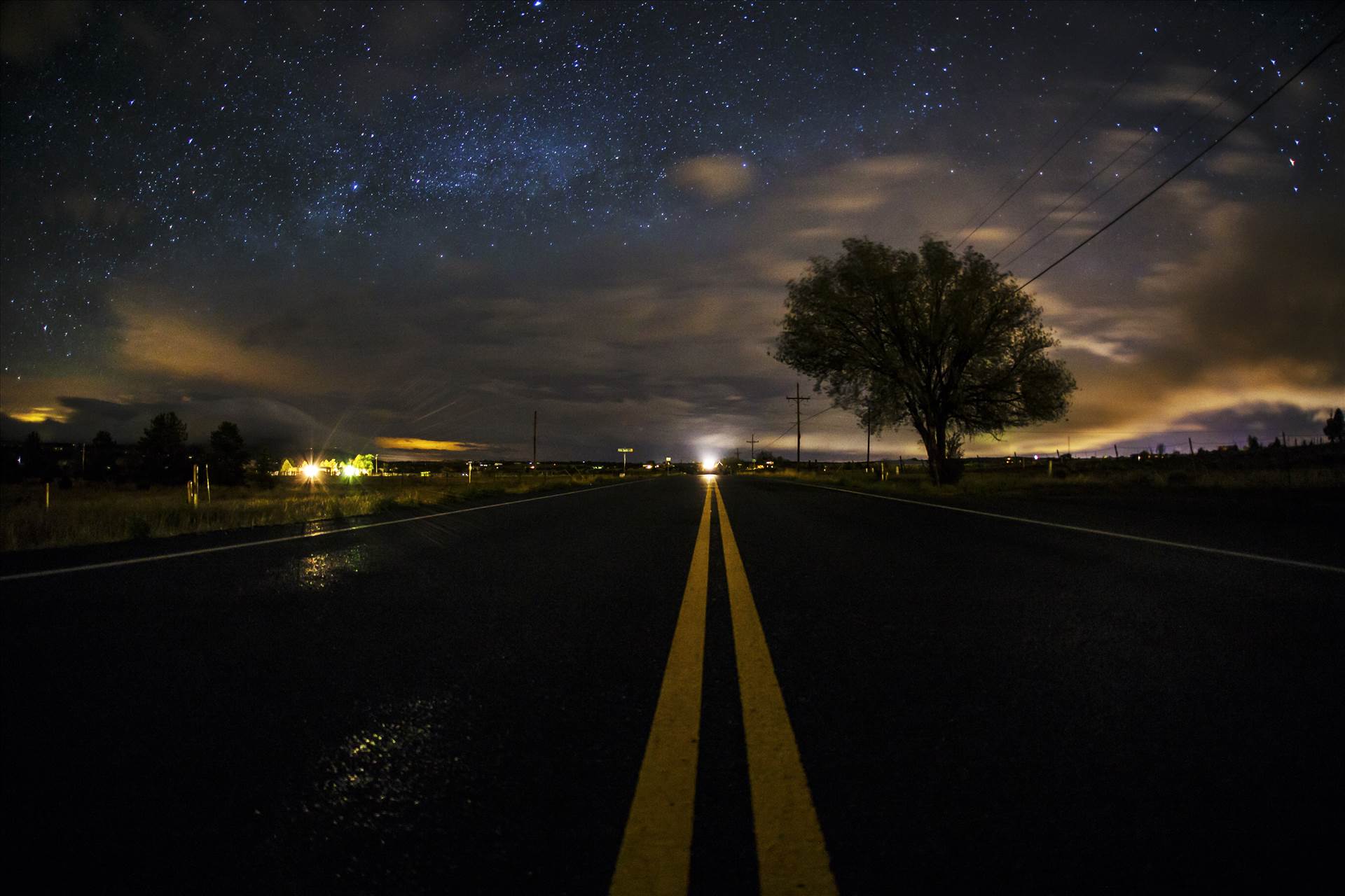 Milky Way Peeking From Behind The Clouds.jpg undefined by Joey Onyxone Sandoval