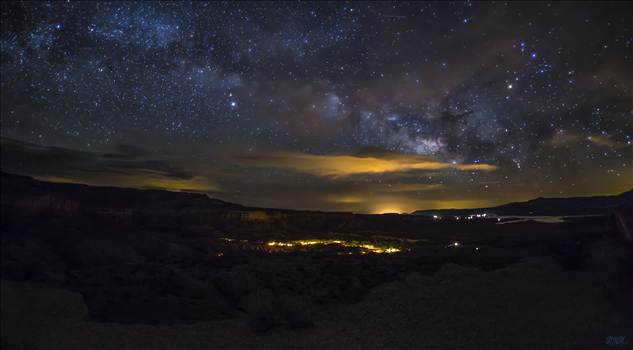 The Milky Way Pouring Into Abiquiu Lake.jpg by Joey Onyxone Sandoval