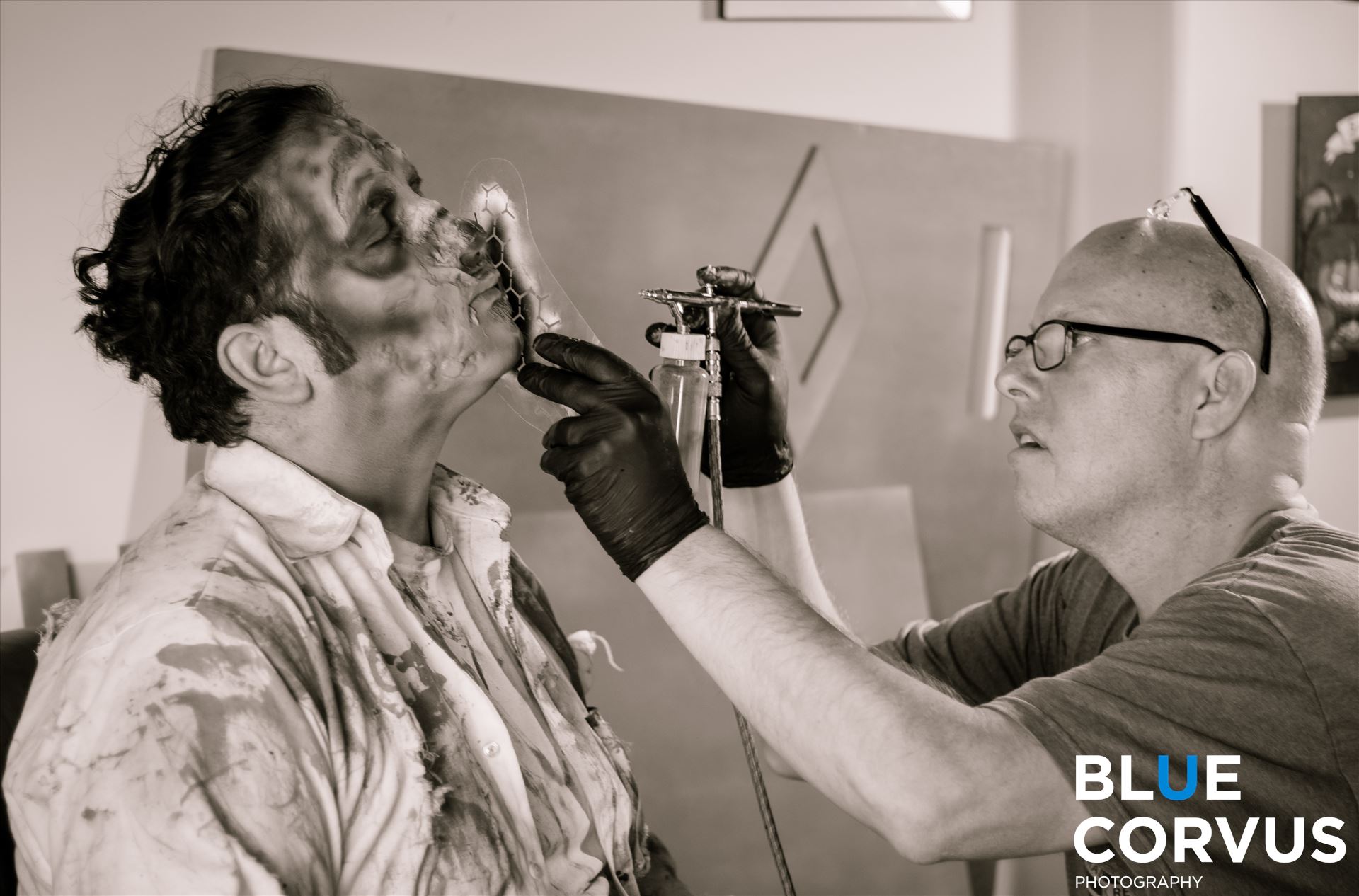 An Artist and His Subject Check out "The Homicidal Home Maker" on Facebook.  Mike Needham applying makeup to his subject.  A behind the scenes look at the show. by Eddie Zamora