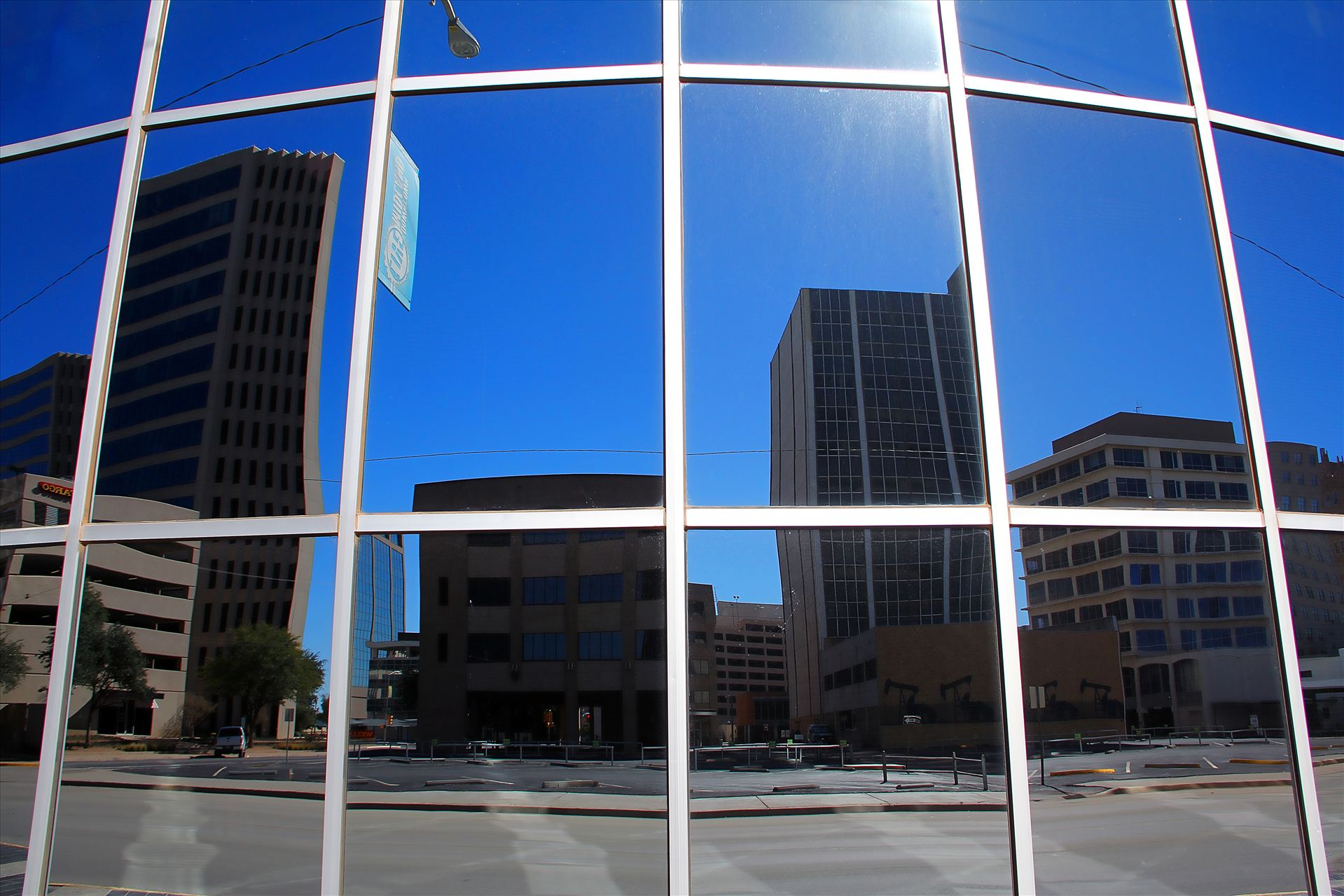 Reflection of Downtoan Midland, TX  by David Verschueren